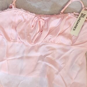No Boundaries Light Pink Chemise Also Comesin Black.